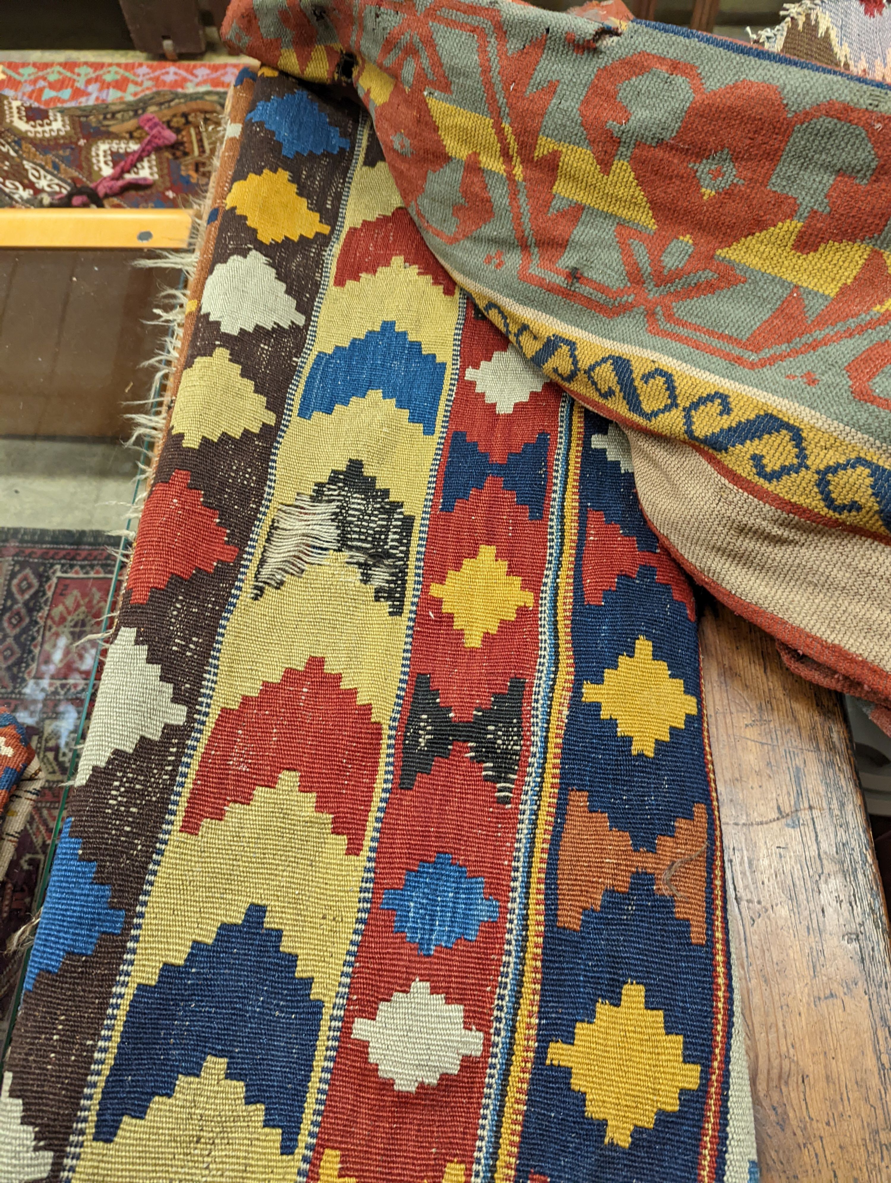 Two antique Kilim hall carpets, both with striped geometric decoration 270 x 128cm and 272 x 158cm both with some holes, 272 x 158cm